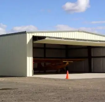 Steel Aircraft Hangars | Bi-Fold & Hydraulic Doors