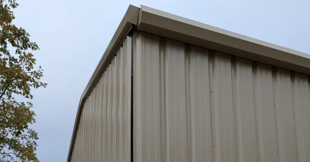 Beige commercial steel building in Ontario built by Tower Steel Buildings showing insulated cladding and clean exterior design