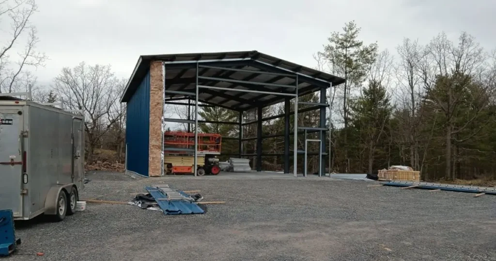 Steel structure under construction in Ontario by Tower Steel Buildings showing durable frame alternative to wood construction