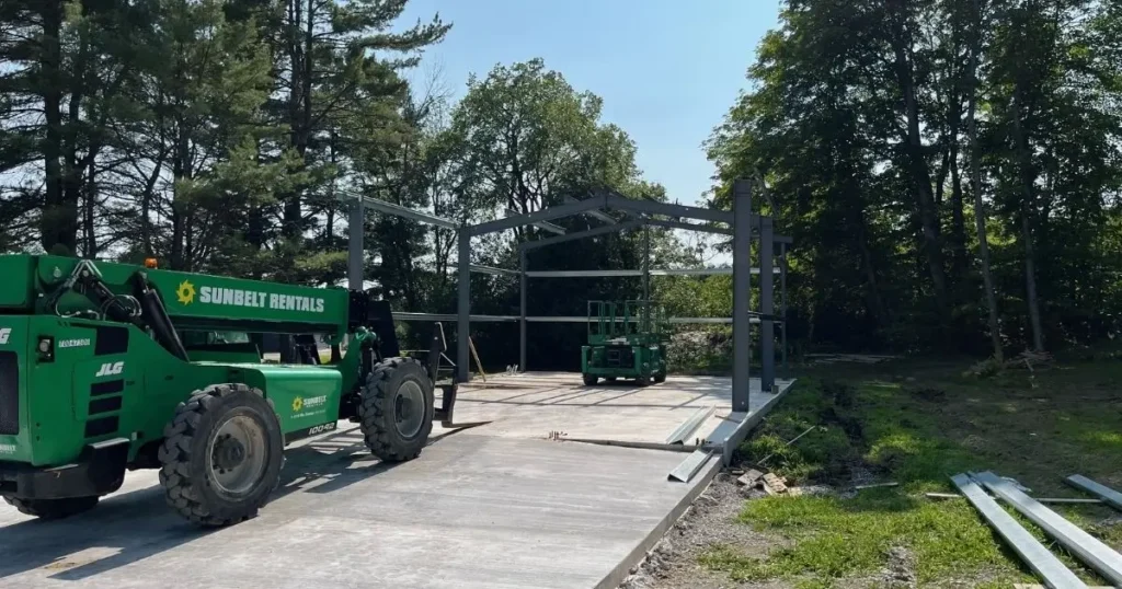 Tower Steel Buildings prefab garage under construction in Ontario showing in-house design and installation