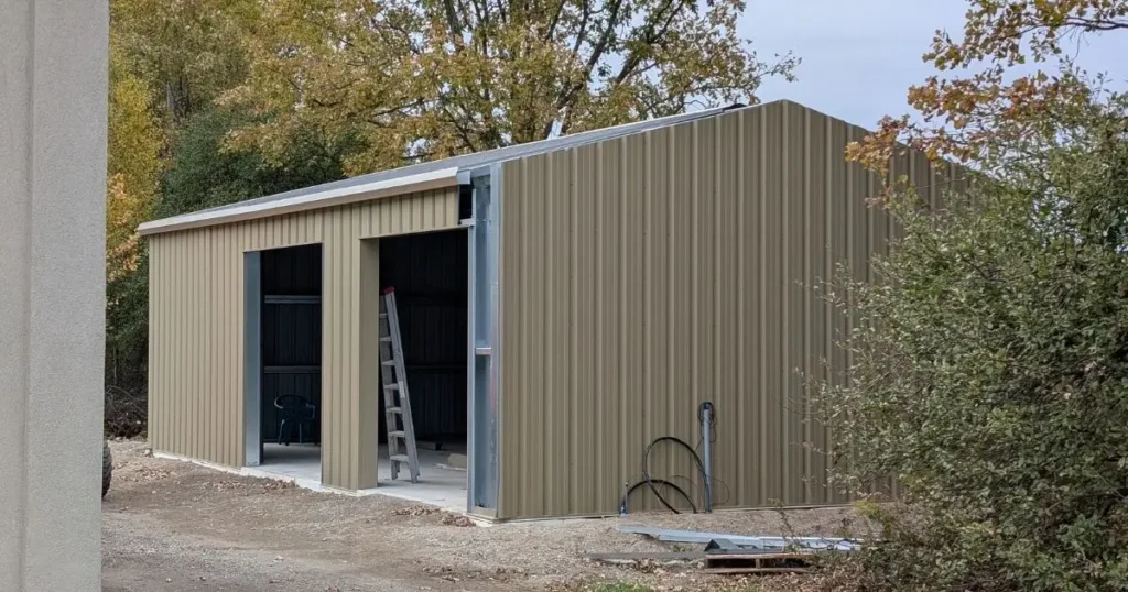 Beige steel building in Ontario designed and built by Tower Steel Buildings for multi-purpose use including storage and workshops
