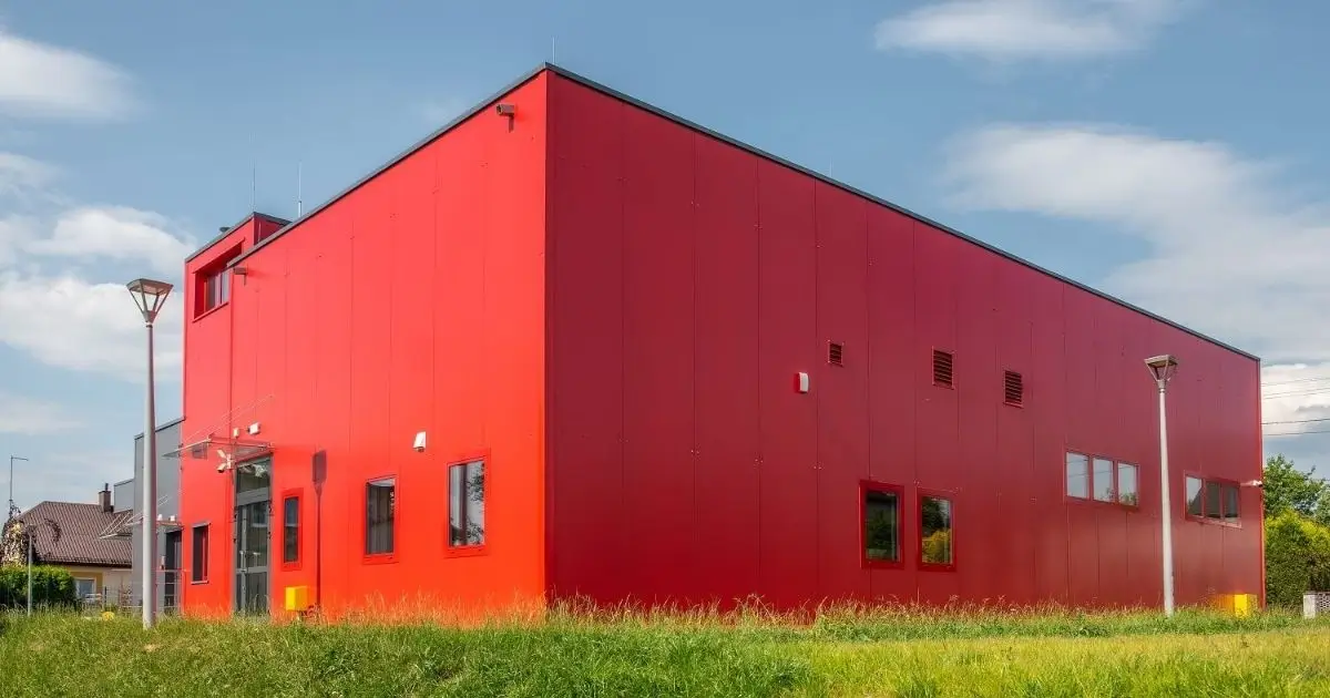 Modern red custom Tower Steel Buildings commercial structure in Ontario