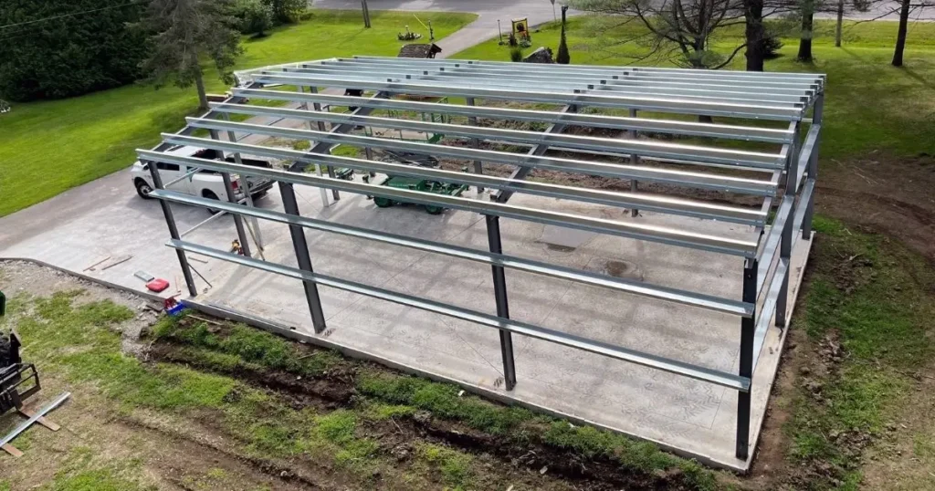 Tower Steel Buildings steel garage framework under construction in Ontario designed for Canadian weather conditions