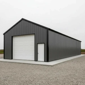 36x50x10 heavy duty steel garage building with vertical metal panels, large roll-up garage door and side access door on concrete slab