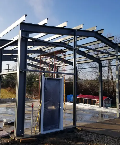 Steel building frame installation in Cornwall Ontario with Canadian engineered structural steel erected on concrete foundation