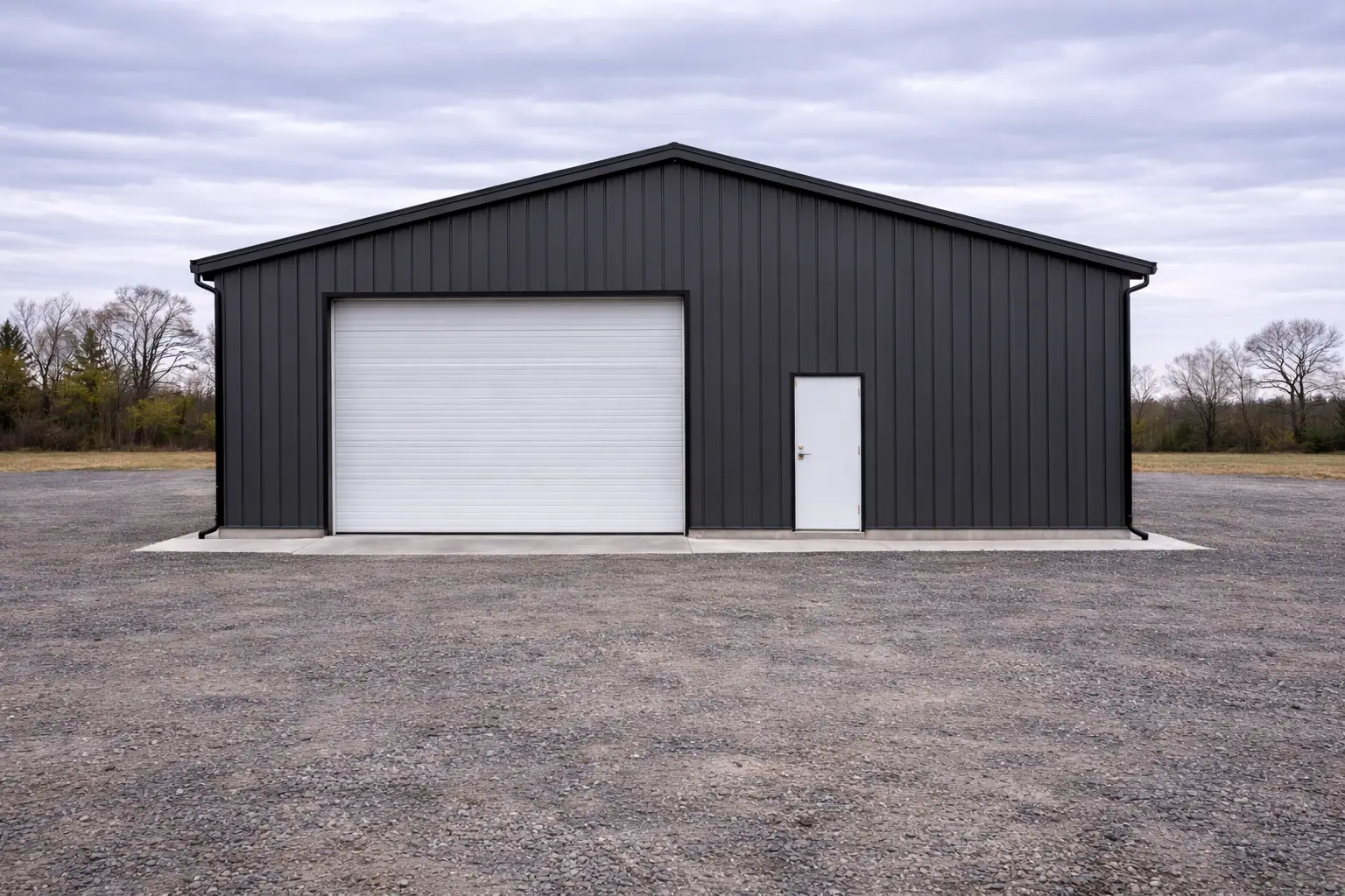 30x50x14 contractor steel workshop rear structural angle showing continuous vertical steel panels and rigid frame building geometry.