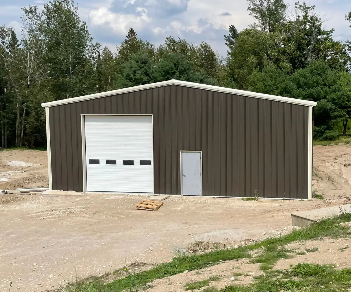 Steel garage building in Ontario requiring zoning setback adjustment before permit approval