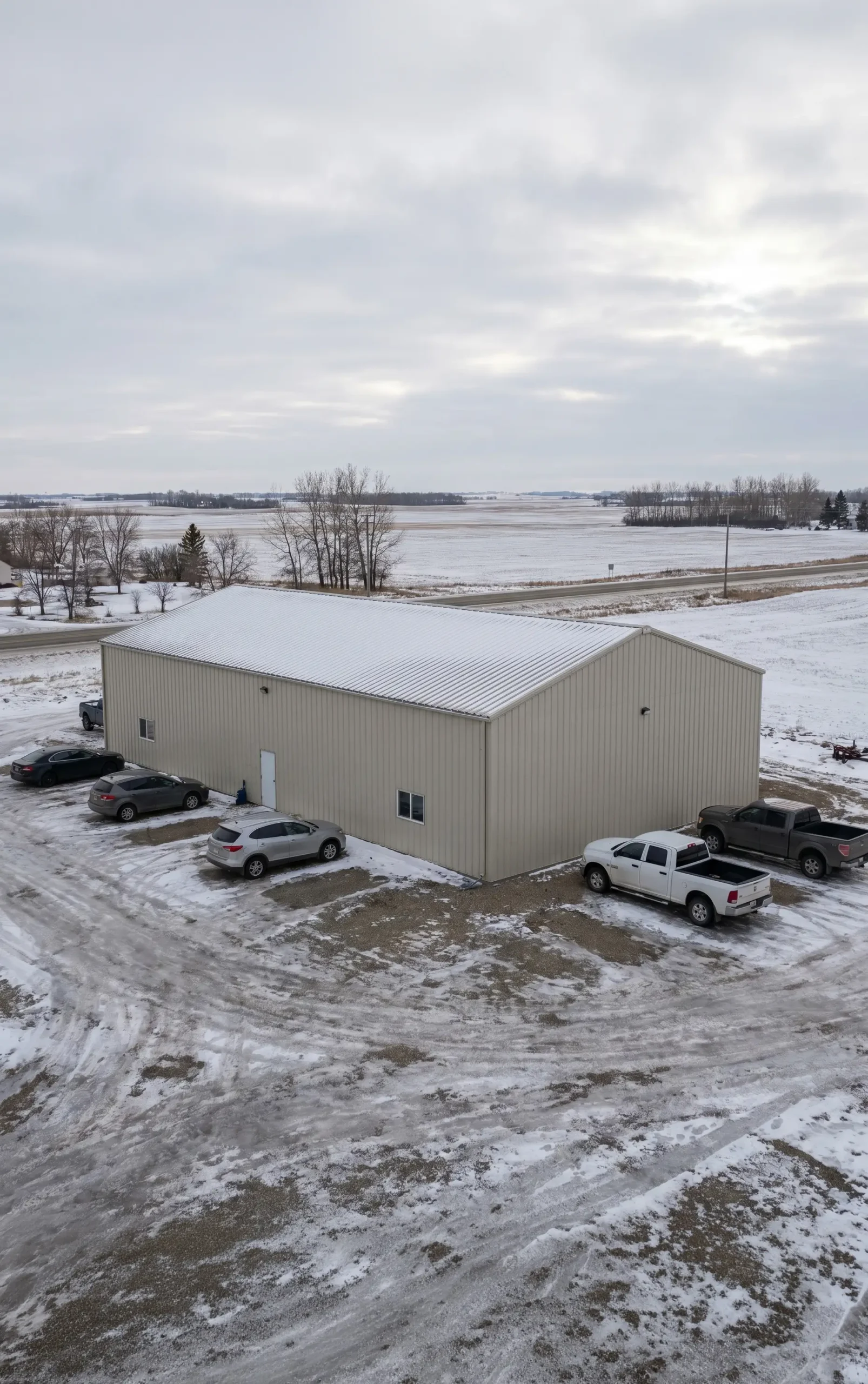 Steel building in Alberta showing snow exposure, site conditions, and environmental design factors